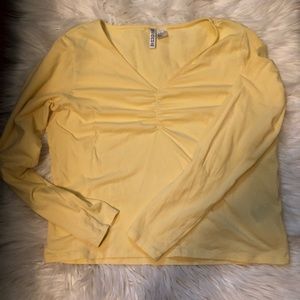 Super cute pale yellow cinched v neck